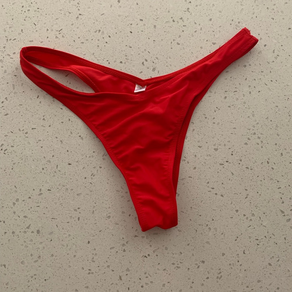 TWO thong bikini bottoms